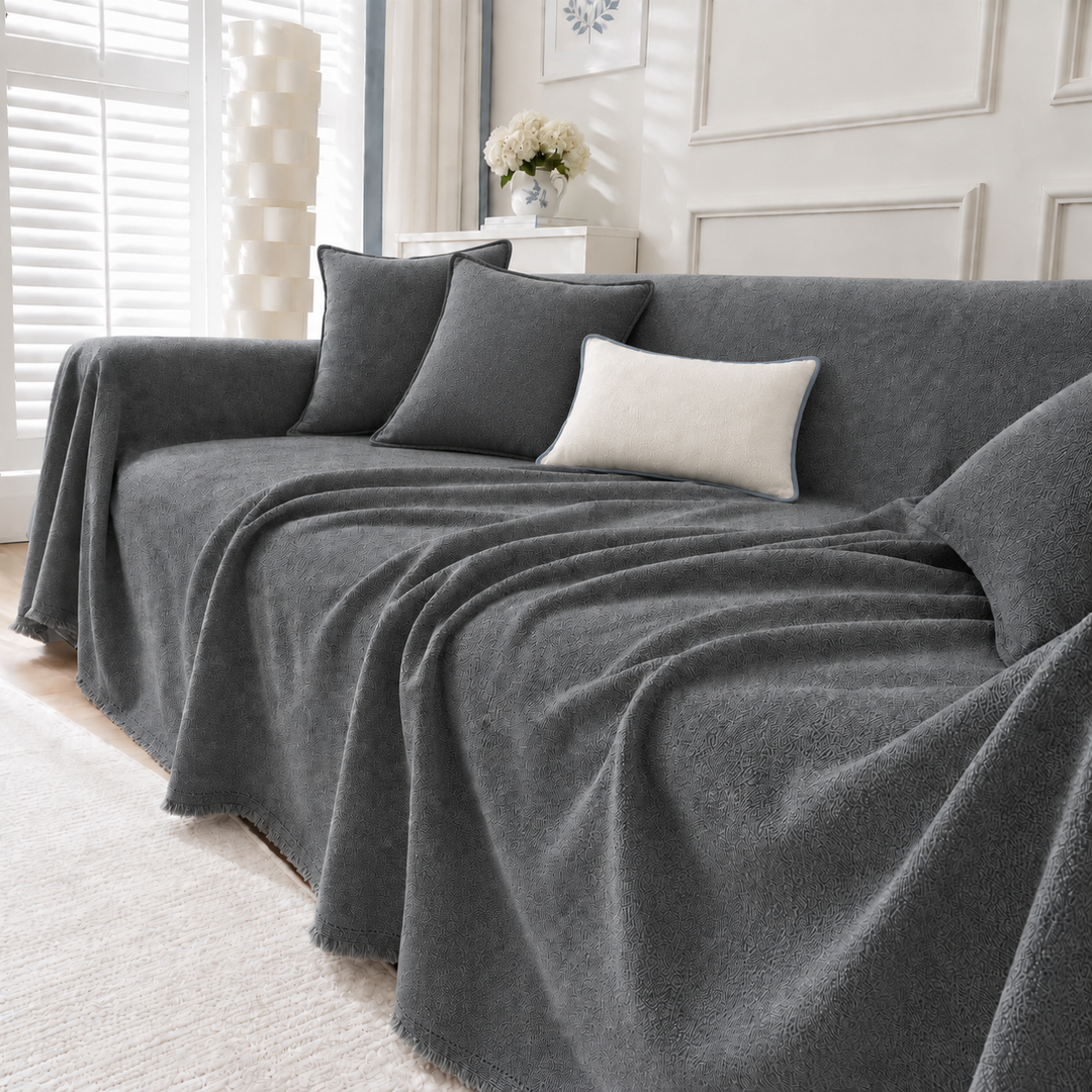 Greer Quilted Couch Cover in dark gray
