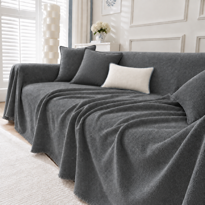 Greer Quilted Couch Cover in dark gray