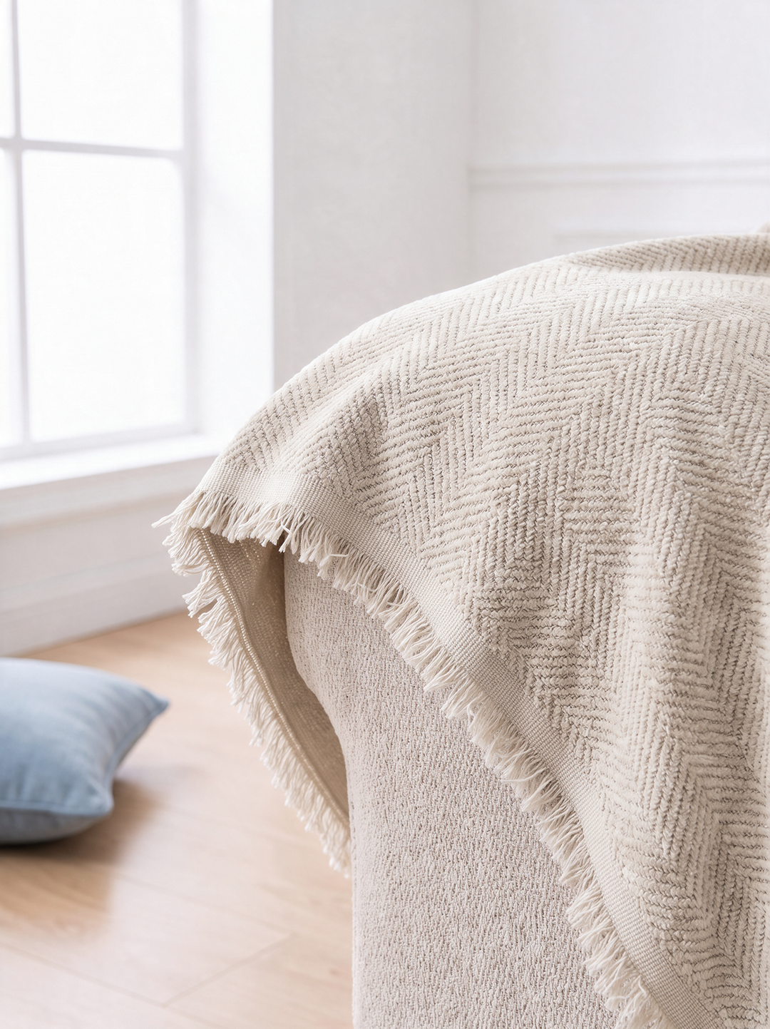 Short fine fringe on the herringbone chenille couch cover edge