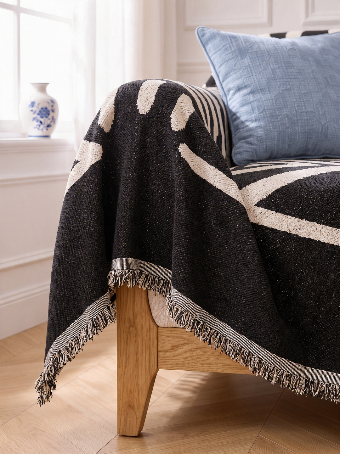 Short fine fringe on the reversible boho couch cover edge